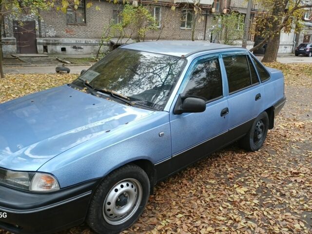 Синій Деу Нексія, об'ємом двигуна 1.5 л та пробігом 246 тис. км за 2000 $, фото 1 на Automoto.ua