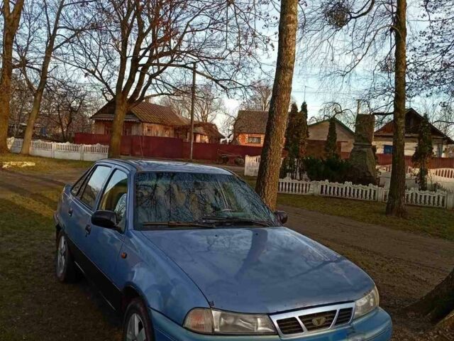 Синій Деу Нексія, об'ємом двигуна 1.5 л та пробігом 187 тис. км за 1233 $, фото 1 на Automoto.ua