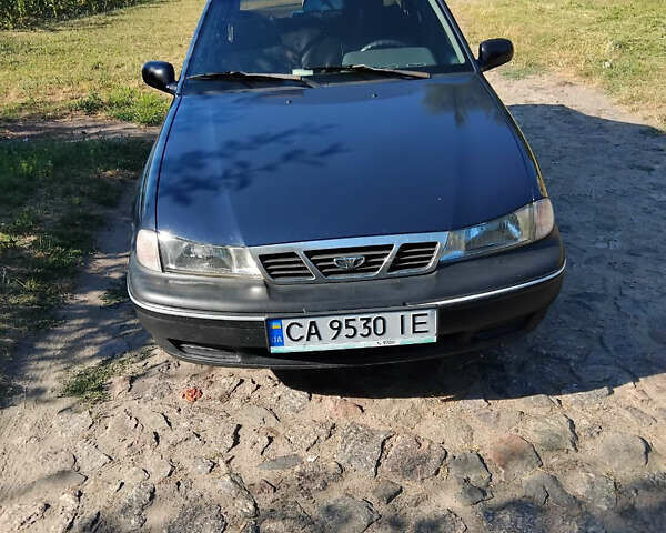 Синий Дэу Нексия, объемом двигателя 1.5 л и пробегом 205 тыс. км за 2100 $, фото 1 на Automoto.ua
