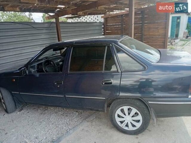 Синій Деу Нексія, об'ємом двигуна 0 л та пробігом 245 тис. км за 1000 $, фото 1 на Automoto.ua