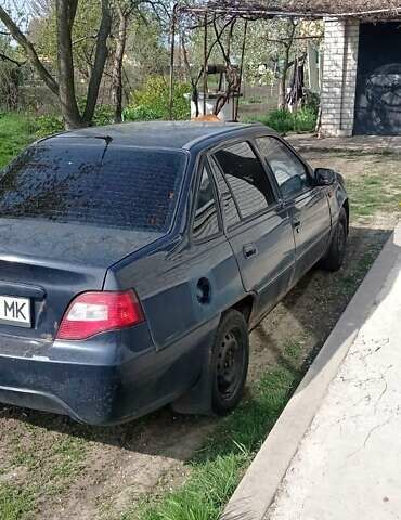 Синий Дэу Нексия, объемом двигателя 1.5 л и пробегом 255 тыс. км за 1100 $, фото 1 на Automoto.ua