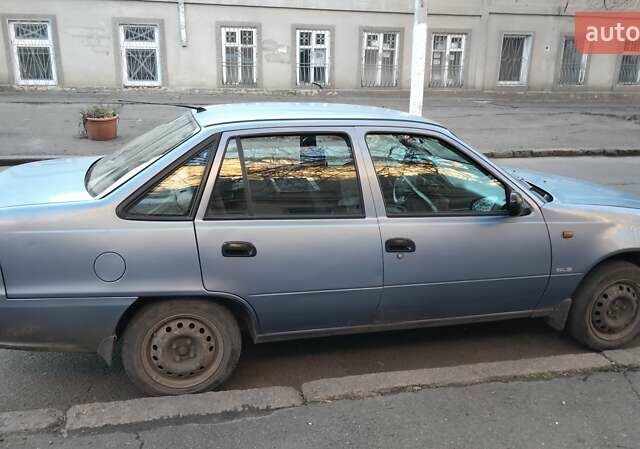Синій Деу Нексія, об'ємом двигуна 1.5 л та пробігом 272 тис. км за 1650 $, фото 1 на Automoto.ua