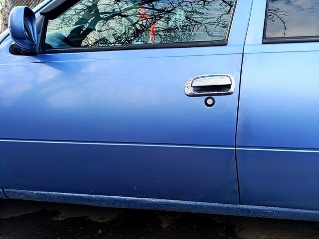 Синий Дэу Нексия, объемом двигателя 1.5 л и пробегом 366 тыс. км за 2000 $, фото 1 на Automoto.ua