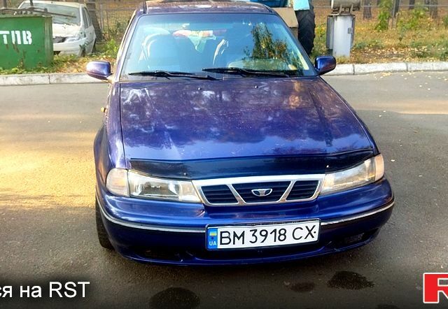 Синий Дэу Нексия, объемом двигателя 1.5 л и пробегом 260 тыс. км за 1500 $, фото 1 на Automoto.ua