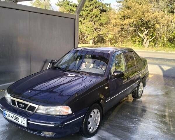 Синій Деу Нексія, об'ємом двигуна 1.5 л та пробігом 250 тис. км за 1301 $, фото 1 на Automoto.ua