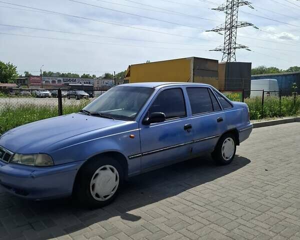 Синій Деу Нексія, об'ємом двигуна 1.6 л та пробігом 226 тис. км за 1327 $, фото 1 на Automoto.ua