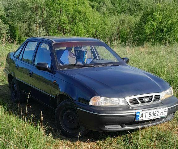 Синій Деу Нексія, об'ємом двигуна 1.5 л та пробігом 293 тис. км за 1500 $, фото 1 на Automoto.ua