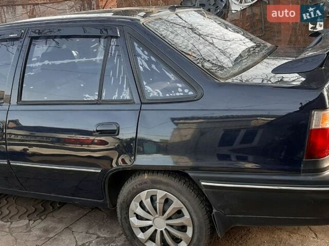 Синий Дэу Нексия, объемом двигателя 1.5 л и пробегом 162 тыс. км за 1500 $, фото 1 на Automoto.ua