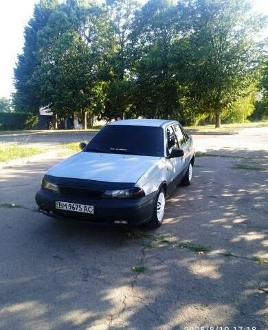 Синий Дэу Нексия, объемом двигателя 1.6 л и пробегом 234 тыс. км за 900 $, фото 1 на Automoto.ua