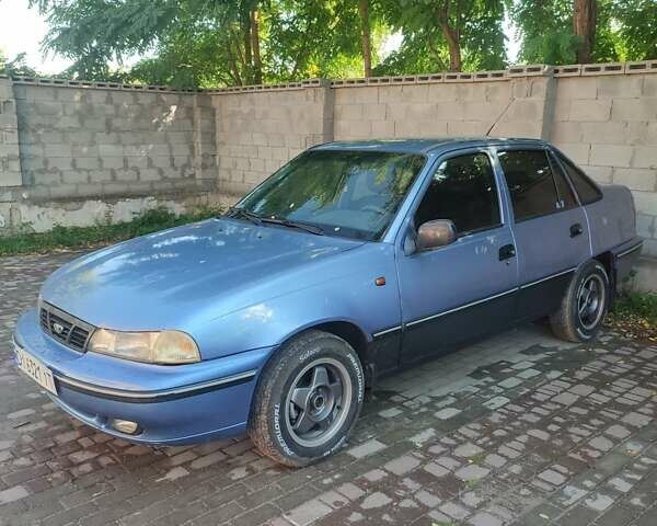 Синій Деу Нексія, об'ємом двигуна 1.5 л та пробігом 290 тис. км за 1000 $, фото 1 на Automoto.ua