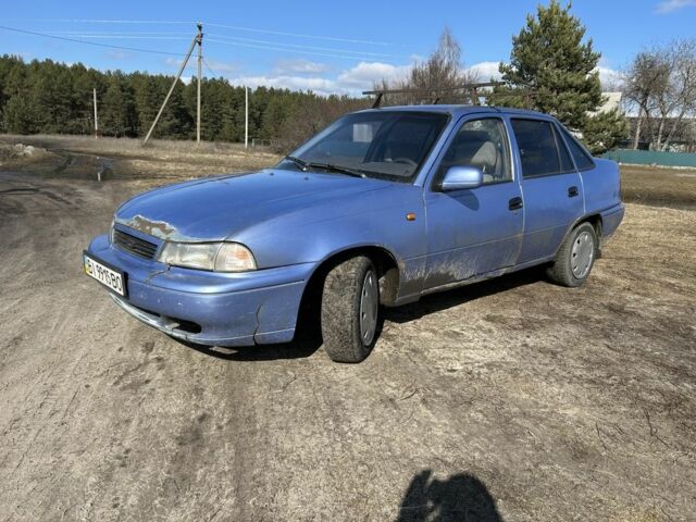 Синий Дэу Нексия, объемом двигателя 1.5 л и пробегом 247 тыс. км за 411 $, фото 1 на Automoto.ua