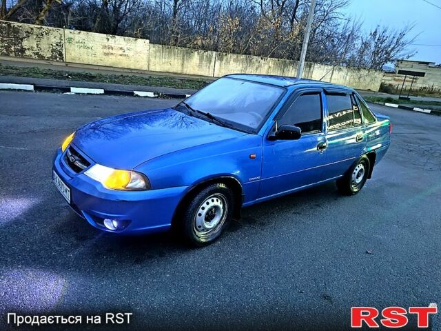 Синій Деу Нексія, об'ємом двигуна 1.6 л та пробігом 233 тис. км за 1600 $, фото 1 на Automoto.ua