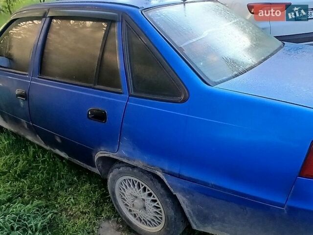 Синий Дэу Нексия, объемом двигателя 1.5 л и пробегом 430 тыс. км за 1300 $, фото 1 на Automoto.ua