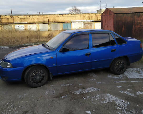 Синий Дэу Нексия, объемом двигателя 1.6 л и пробегом 128 тыс. км за 2300 $, фото 1 на Automoto.ua