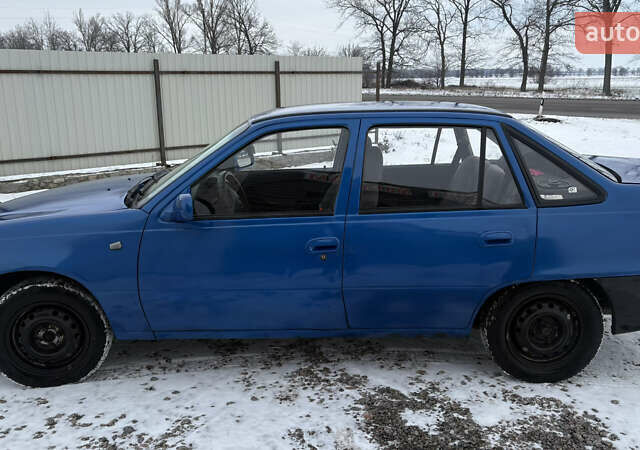 Синій Деу Нексія, об'ємом двигуна 1.5 л та пробігом 235 тис. км за 1300 $, фото 1 на Automoto.ua