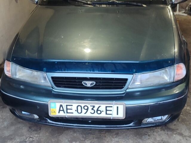 Зелений Деу Нексія, об'ємом двигуна 1 л та пробігом 350 тис. км за 854 $, фото 1 на Automoto.ua