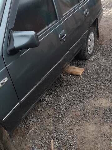 Зеленый Дэу Нексия, объемом двигателя 1.5 л и пробегом 246 тыс. км за 2800 $, фото 1 на Automoto.ua