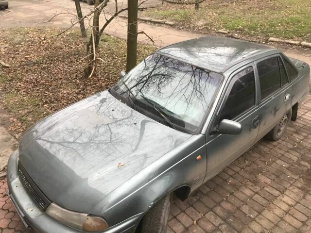 Зеленый Дэу Нексия, объемом двигателя 1.5 л и пробегом 232 тыс. км за 1018 $, фото 1 на Automoto.ua