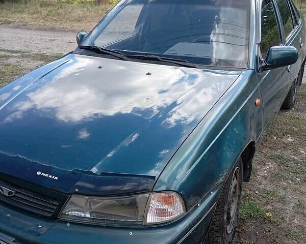 Зеленый Дэу Нексия, объемом двигателя 1.5 л и пробегом 319 тыс. км за 845 $, фото 1 на Automoto.ua