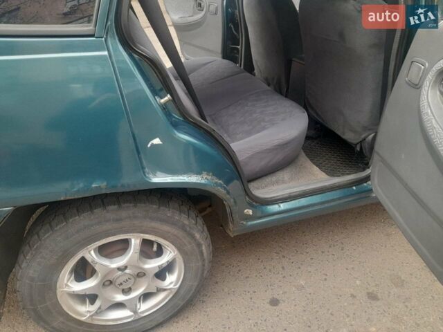 Зелений Деу Нексія, об'ємом двигуна 1.5 л та пробігом 258 тис. км за 2100 $, фото 1 на Automoto.ua