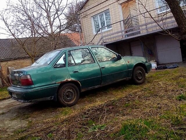 Зеленый Дэу Нексия, объемом двигателя 1.5 л и пробегом 242 тыс. км за 1000 $, фото 1 на Automoto.ua