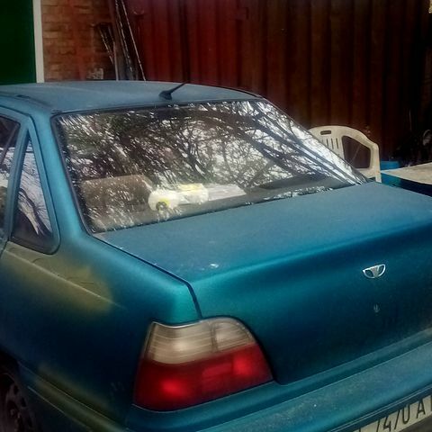 Зеленый Дэу Нексия, объемом двигателя 1.5 л и пробегом 250 тыс. км за 2000 $, фото 1 на Automoto.ua