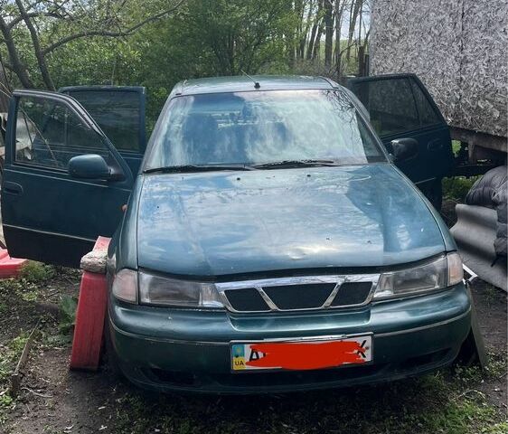Зелений Деу Нексія, об'ємом двигуна 1.5 л та пробігом 300 тис. км за 1000 $, фото 1 на Automoto.ua