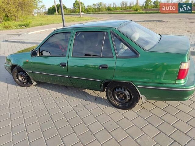 Зеленый Дэу Нексия, объемом двигателя 1.5 л и пробегом 300 тыс. км за 999 $, фото 1 на Automoto.ua