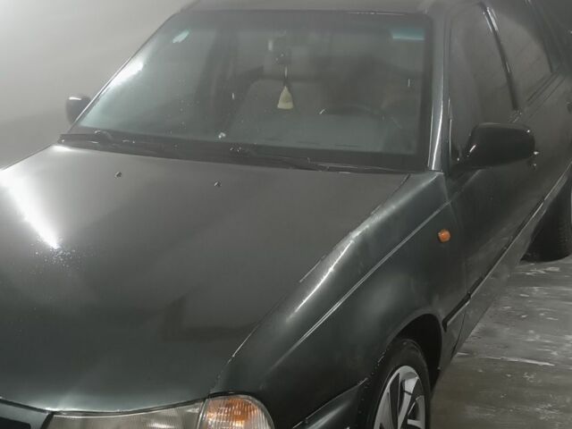 Зеленый Дэу Нексия, объемом двигателя 1.5 л и пробегом 291 тыс. км за 1300 $, фото 1 на Automoto.ua