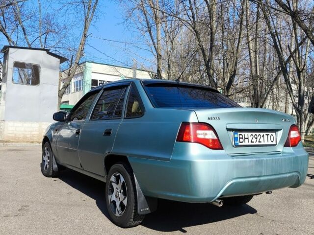 Зелений Деу Нексія, об'ємом двигуна 1.5 л та пробігом 250 тис. км за 2600 $, фото 1 на Automoto.ua