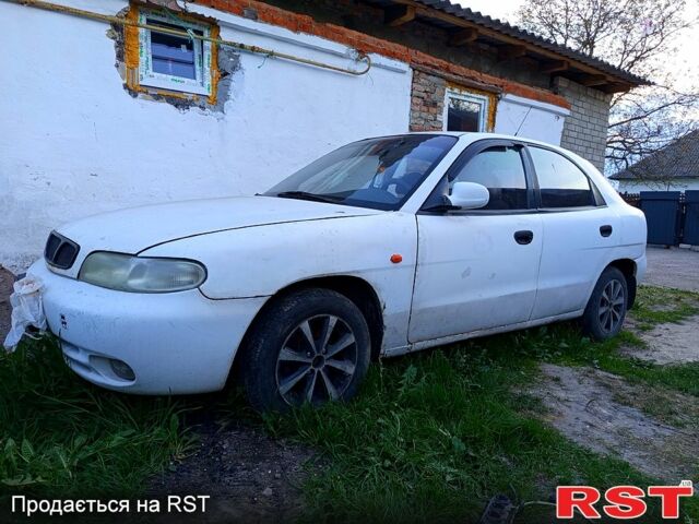 Белый Дэу Нубира, объемом двигателя 1.6 л и пробегом 230 тыс. км за 650 $, фото 1 на Automoto.ua