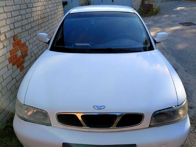 Белый Дэу Нубира, объемом двигателя 1.6 л и пробегом 345 тыс. км за 590 $, фото 1 на Automoto.ua