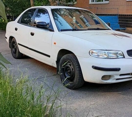 Білий Деу Нубіра, об'ємом двигуна 1.6 л та пробігом 242 тис. км за 845 $, фото 1 на Automoto.ua