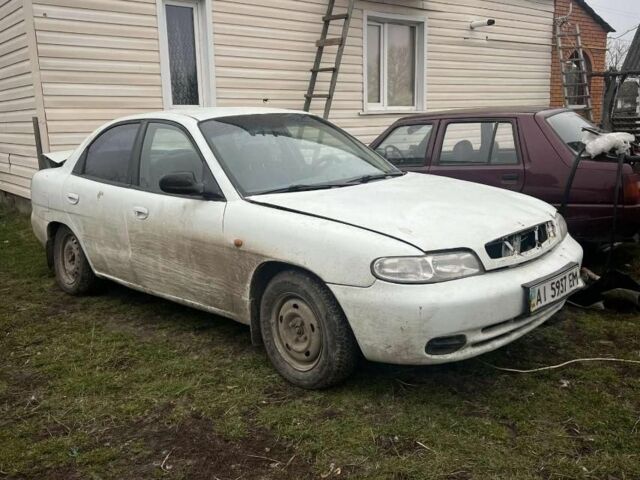 Белый Дэу Нубира, объемом двигателя 1.6 л и пробегом 340 тыс. км за 450 $, фото 1 на Automoto.ua