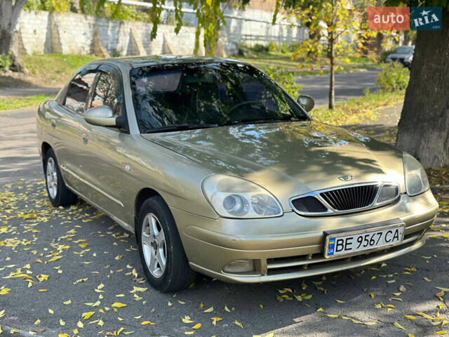 Бежевый Дэу Нубира, объемом двигателя 2 л и пробегом 220 тыс. км за 2200 $, фото 1 на Automoto.ua