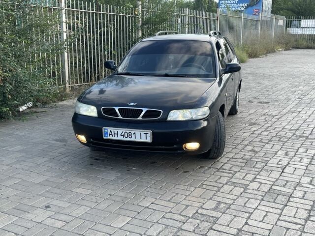 Черный Дэу Нубира, объемом двигателя 1.6 л и пробегом 258 тыс. км за 2000 $, фото 1 на Automoto.ua