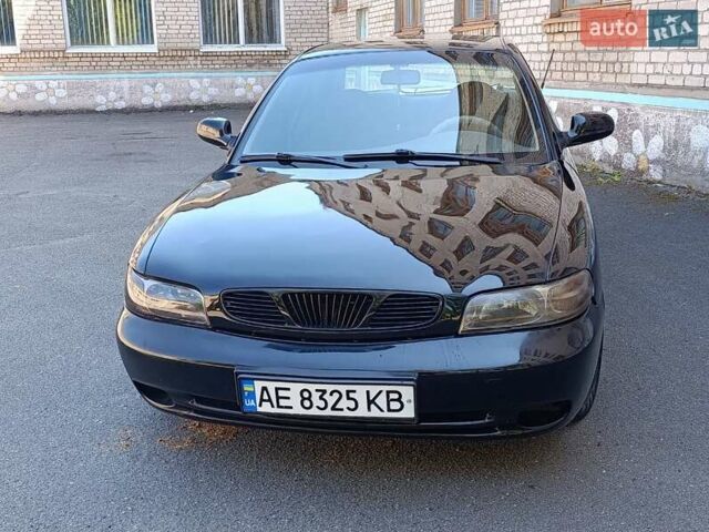 Черный Дэу Нубира, объемом двигателя 1.6 л и пробегом 362 тыс. км за 1600 $, фото 1 на Automoto.ua