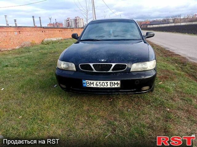 Чорний Деу Нубіра, об'ємом двигуна 1.6 л та пробігом 111 тис. км за 1111 $, фото 1 на Automoto.ua