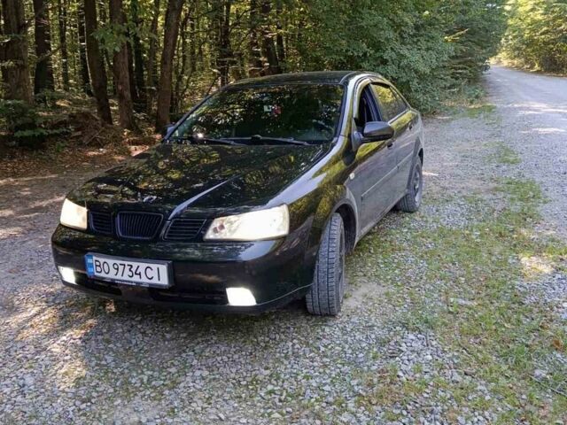 Черный Дэу Нубира, объемом двигателя 1.8 л и пробегом 286 тыс. км за 3800 $, фото 1 на Automoto.ua