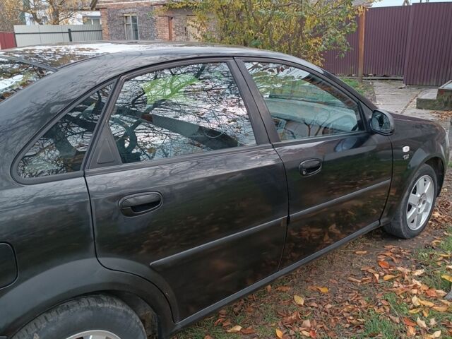 Черный Дэу Нубира, объемом двигателя 1.8 л и пробегом 302 тыс. км за 2700 $, фото 1 на Automoto.ua