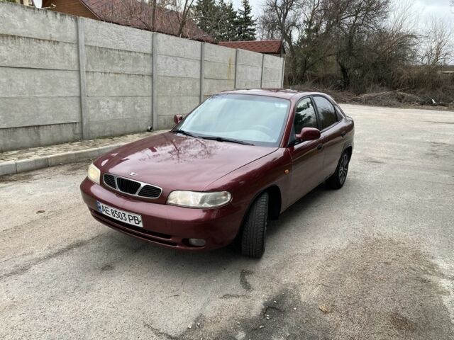 Красный Дэу Нубира, объемом двигателя 1.6 л и пробегом 280 тыс. км за 1350 $, фото 1 на Automoto.ua