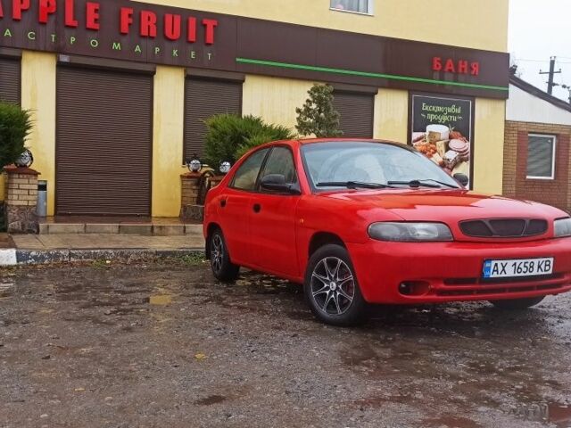 Деу Нубіра 1998 у Люботине на Automoto.ua Червоний Деу Нубіра, об'ємом двигуна 1.6 л та пробігом 225 тис. км за 1800 $, фото 1 на Automoto.ua