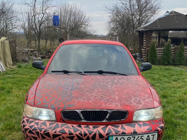 Красный Дэу Нубира, объемом двигателя 1.6 л и пробегом 180 тыс. км за 1050 $, фото 1 на Automoto.ua