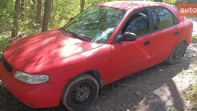 Красный Дэу Нубира, объемом двигателя 2 л и пробегом 313 тыс. км за 1700 $, фото 1 на Automoto.ua