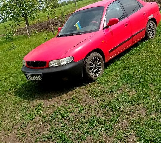 Червоний Деу Нубіра, об'ємом двигуна 1.6 л та пробігом 0 тис. км за 1200 $, фото 1 на Automoto.ua