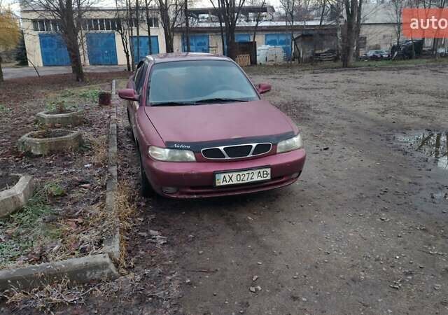 Червоний Деу Нубіра, об'ємом двигуна 1.6 л та пробігом 300 тис. км за 1200 $, фото 1 на Automoto.ua