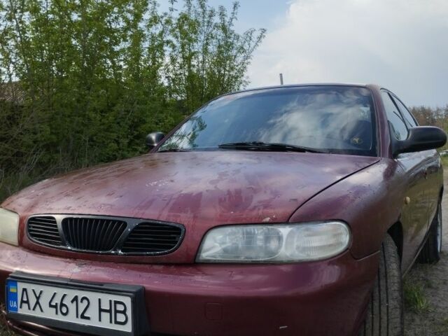 Красный Дэу Нубира, объемом двигателя 2 л и пробегом 200 тыс. км за 1100 $, фото 1 на Automoto.ua