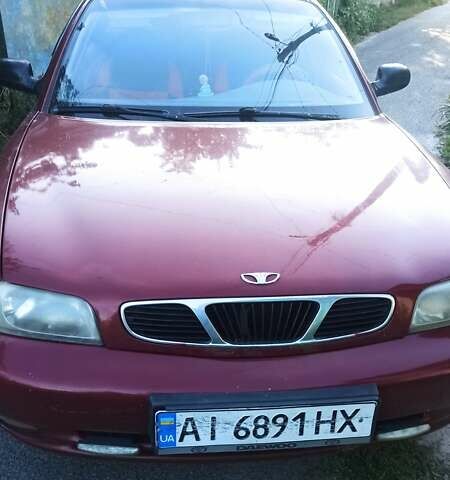 Червоний Деу Нубіра, об'ємом двигуна 1.6 л та пробігом 378 тис. км за 1100 $, фото 1 на Automoto.ua