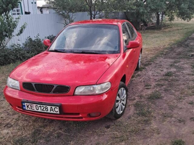 Красный Дэу Нубира, объемом двигателя 1.6 л и пробегом 37 тыс. км за 1400 $, фото 1 на Automoto.ua
