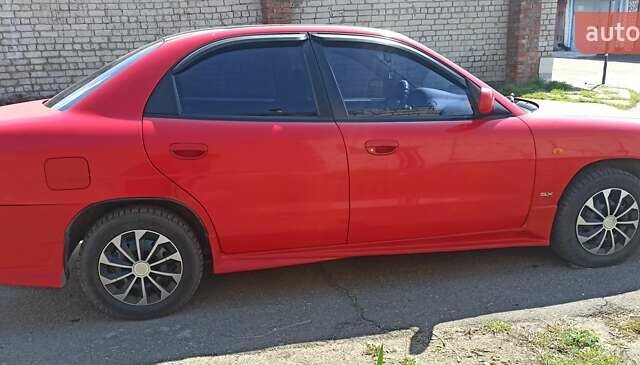 Красный Дэу Нубира, объемом двигателя 1.6 л и пробегом 195 тыс. км за 2800 $, фото 1 на Automoto.ua